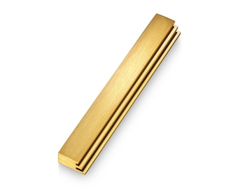May include: A set of three gold-colored metal strips, stacked on top of each other. The strips are smooth and have a brushed finish.