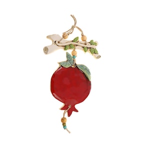 pomegranate on a branch- Nurit Teva