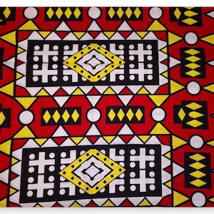 May include: A vibrant fabric with a geometric pattern in red, black, yellow, and white. The design features repeating shapes, including diamonds, triangles, and rectangles, creating a bold and eye-catching textile.