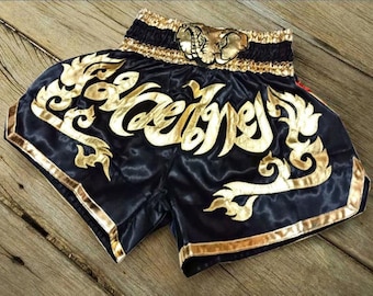 Pantalones cortos de boxeo Muay Thai para adultos - Elefante negro y dorado con raya tailandesa