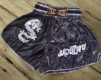Pantalones cortos de boxeo Muay Thai para adultos - Negro con dragón plateado