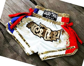 Muay Thai Boxing Shorts for Adult - White with Blue & Red Side with Gold Thai Pattern Stripes - Thai Boxing Shorts from Thailand