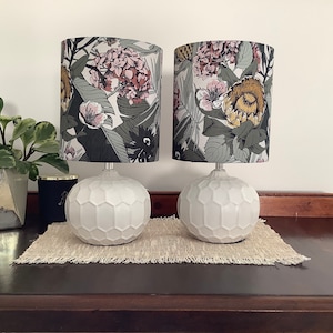 2x  lampshades featuring  proteas and other native  flowers and native foliage with a green background, perfect for bedside table lamps.