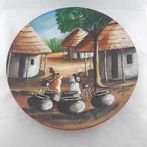 Piatto africano dipinto a mano firmato Emlsese Making Pots 11 pollici di diametro