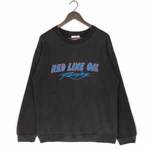 May include: Black sweatshirt with a red and blue logo that says "Red Line Oil Racing".