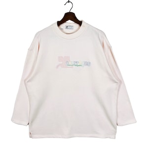 May include: A pale pink Courr&egrave;ges sweatshirt with long sleeves, hanging on a wooden hanger. The brand's logo is embroidered in a gradient of colours across the chest. The sweatshirt has a crew neck and a relaxed fit.