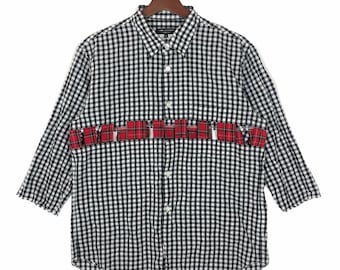 ¡¡EXTRAÑO!! Camisa deconstruida de Comme Des Garcons Homme Plus