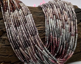 May include: A strand of faceted gemstone beads in shades of pink, purple, and white. The beads are small and round, and they are strung on a clear thread. The beads are arranged in a random pattern, and they create a beautiful and delicate effect.