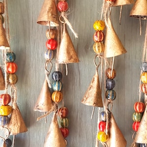 Bells on string with 6 rustic vintage cow bells and multicolored handmade ceramic beads, bronze gold bells with melodic tone, windchime