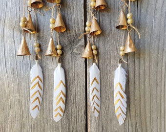 Windchime with white feather with gold decoration with gold breads and rustic colored metal cow bells, Ethnic, Boho, feng shui gift present