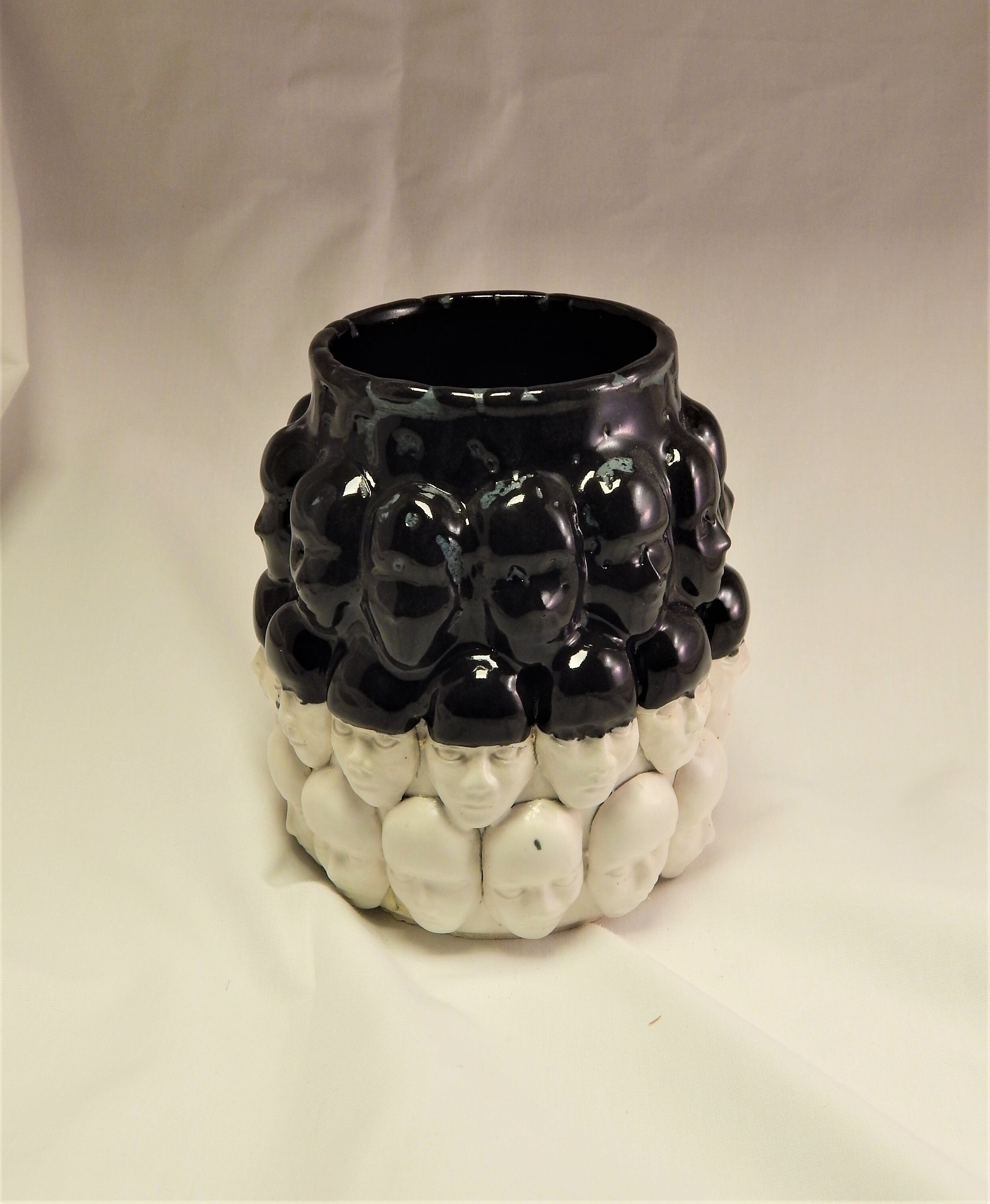 Black And White Vase With Faces