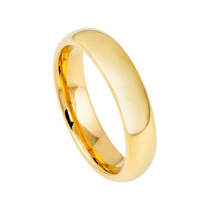 May include: A simple gold wedding band with a polished finish.