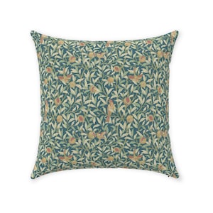 May include: Teal blue throw pillow with a repeating pattern of stylized birds and pomegranates.