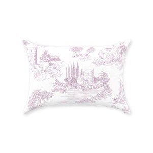 May include: A rectangular decorative pillow with a toile pattern in shades of lavender and white. The design features a pastoral scene with buildings, trees, and a bridge. The pillow is a soft, comfortable home decor item.