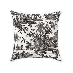 May include: Square throw pillow with a black and white toile pattern. The design features classical figures, trees, birds, and other elements in a detailed, vintage style. The pillow is likely made of a soft fabric and is suitable for home decor.