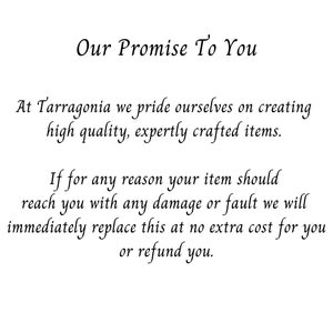 May include: White background with black text. The text reads "Our Promise To You" followed by a statement about creating high-quality, expertly crafted items. It also mentions a replacement or refund policy for damaged items.