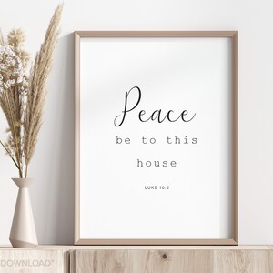 May include: A printable wall art print with a white background and black text that reads "Peace be to this house" with the scripture reference "Luke 10:5" underneath.