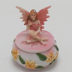 Mini Pink Flower Fairy Sitting on a Trinket Box