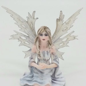 Winter Fairy sitting with an Orb Collectible Figurine Statue H = 4.75 in