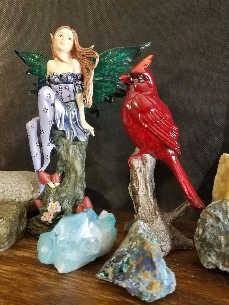 red cardinal garden statue