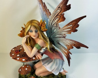 Brown and Orange Fairy with Mushroom Figurine