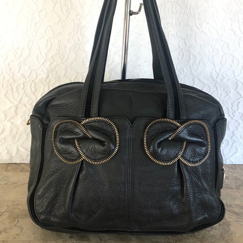 SEE by CHLOE retailer black Pebbled leather shoulder bag w/zipped bow detail