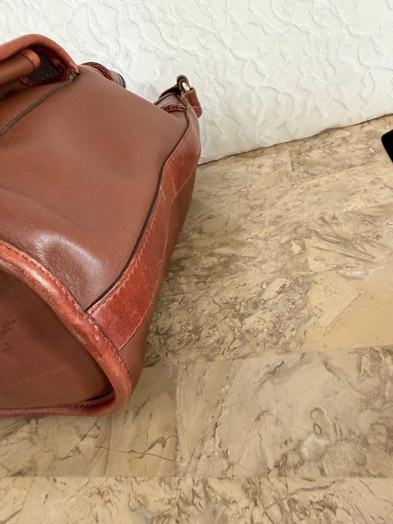 May include: A set of three ceramic mugs with a speckled, matte finish. The mugs are in shades of cream, light gray, and dark gray. Each mug has a simple, minimalist design, perfect for coffee or tea.