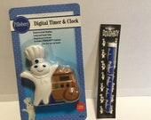 1997 Pillsbury doughboy kitchen timer and pen