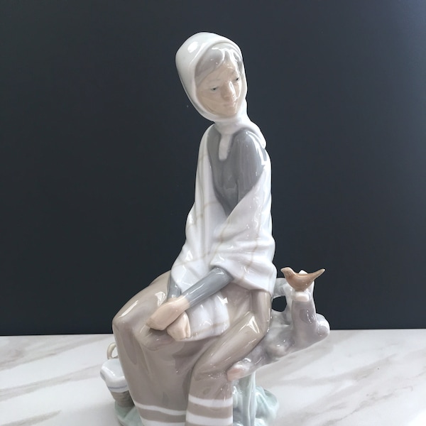 Vintage Lladro figurine. This vintage figurine is a Shepherdess with dove. Made in Spain. This nature figurine is the perfect Spanish gift!