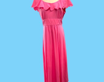May include: A hot pink maxi dress with a scalloped ruffle neckline and short sleeves.