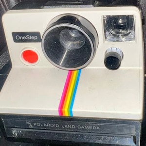 Polaroid  Vintage One Step Land Camera with Strap. Original White with  Rainbow Stripe from the  first name in Instant developing cameras