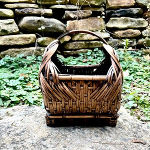 Japanese Ikebana Basket Mid 20th Century. Hand Woven Bamboo Footed Basket with Handle     for traditional Japanese art of flower arrangement