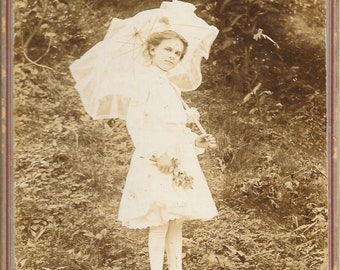 Girl with Parasol (Umbrella) Wearing Stockings and Holding Flowers. Great Vintage Black and White Photograph from Standard Photo Company.