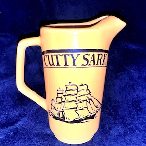Cutty Sark Scots Whiskey Pitcher with the same logo on the bottle since 1955 by marine artist Cael Georg August Wallin his most famous work