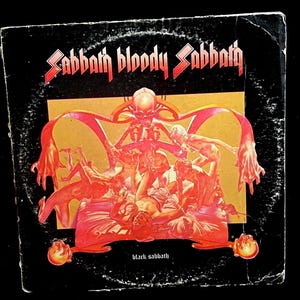 Ozzy Black Sabbath - Sabbath Bloody Sabbath 1973 release studio album Sabbath Bloody Sabbath. The band&#39;s fifth studio album, Gold in a year.