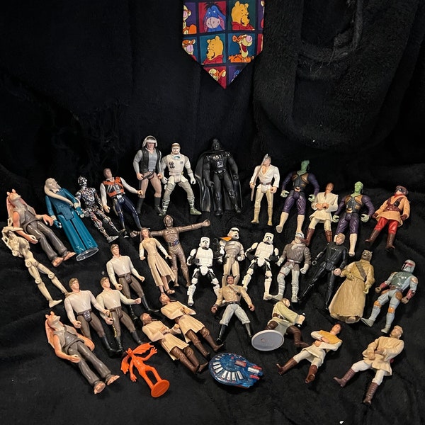 Star Wars Action Figures 32+ Vintage 1996-2000 figured from Kenner and Hasbro w/ or without unrelated Star Trek Case currently housing them.