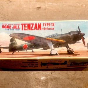 1/72 Fujimi B6N2 Jill Tenzan Type 12 Reinforcer WW2 Japanese Plastic Model Kit. All parts remain Sealed and Mint Unopened Inside Box.