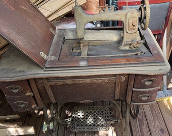 4 vintage sewing machines and 3 vintage sewing machine tables. Must pick up in East Tennessee or arrange for shipping with our assistance.