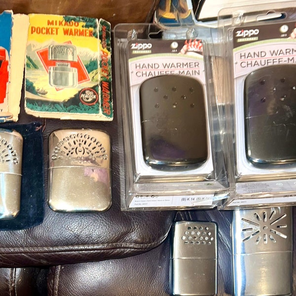 Vintage Zippo Hand Warmers, Mikado Occupied Japan & Peterson Peacocks, John E Hand+ Sealed to bold colored boxes or no box. Also made HK USA