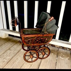 Vintage Antique Styled Baby Doll Carriage / Doll Stroller. Working wooden wheels. Top goes up and down Excellent display, play or photo prop