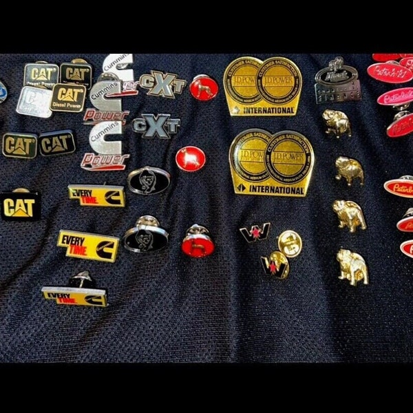 CAT, Cummins, Mack, Peterbilt, International, etc. Trucker and Mechanic Pins! Enamel, Metal, Plastic. Authentic Diesel & Big Engine Pins!