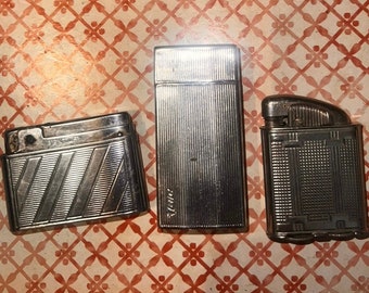 1930s Imco Safety 4200 Fleur De Lis Design Squeeze Lighter