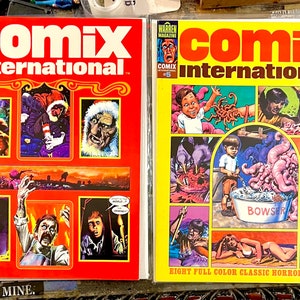 May include: Two vintage comic books with the title "Comix International" on the cover. The covers feature colorful illustrations of horror and fantasy scenes. The first comic is issue number 4 and the second is issue number 5.