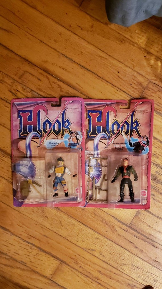 Hook Action Figures Peter Pan and Lost Boy Water Shooting Ace Hoses Down  Pirates and Swashbuckling Peter Pan Swings His Sword 1991 Mattel 