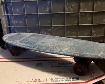 Skateboard Pro Class Hot Dogger IV Vintage  1970’s Classic Blue Skateboard with Red Wheels 21.5” long.