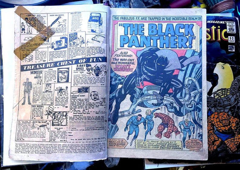 May include: Vintage comic book pages featuring "The Black Panther" and "Fantastic Four" comics. The Black Panther comic has a large illustration of the character. The "Treasure Chest of Fun" advertisement is also visible.