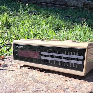 This Sony Dream Machine clock radio.  Wonderful vintage 1980s addition to any home decor. With its sleek design and easy-to-read display