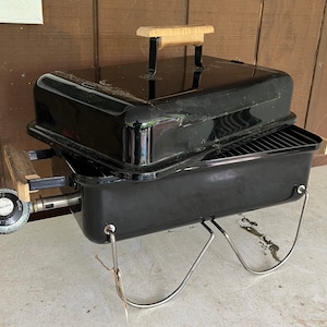 Marlboro Portable Gas Grill  from the The Weber Go Anywhere series. A grill that would make the Marlboro Man proud! Tobacco Advertising