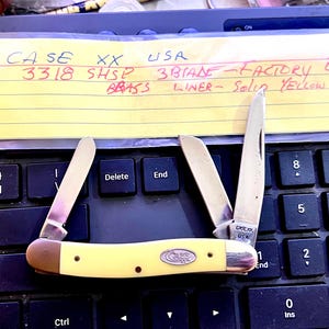 Case XX USA 3 Blade Pocket Knife 3318 SHSP Stockman with Factory Edge, Brass Liner, Solid Yellow Case. Very Nice Knife in great condition.
