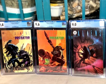Aliens vs Predator #0 - CGC 9.4 and Aliens VS Predator #1 - 9.6 NM+ 1990 w/ Pin Up & 1st Appearance! Aliens  1 1989 CGc 9.0
